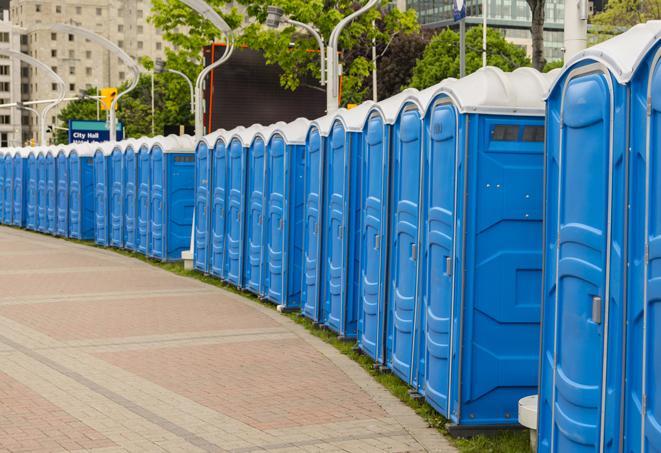 a row of portable restrooms at a fairground, offering visitors a clean and hassle-free experience in Alameda